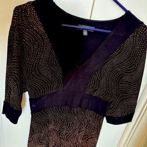 Dress Barn top, black with gold embellishments.​